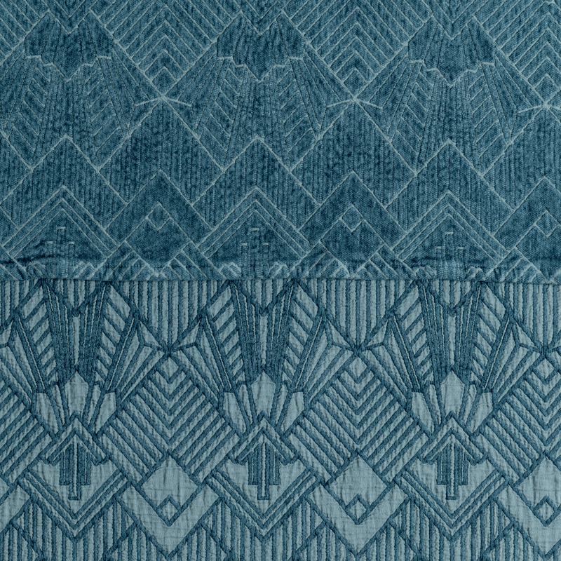 The Trettino Collection | Cenote | a close-up showing the chenille jacquard on the top half and cotton jacquard on the bottom in cenote, a teal-like jewel tone.