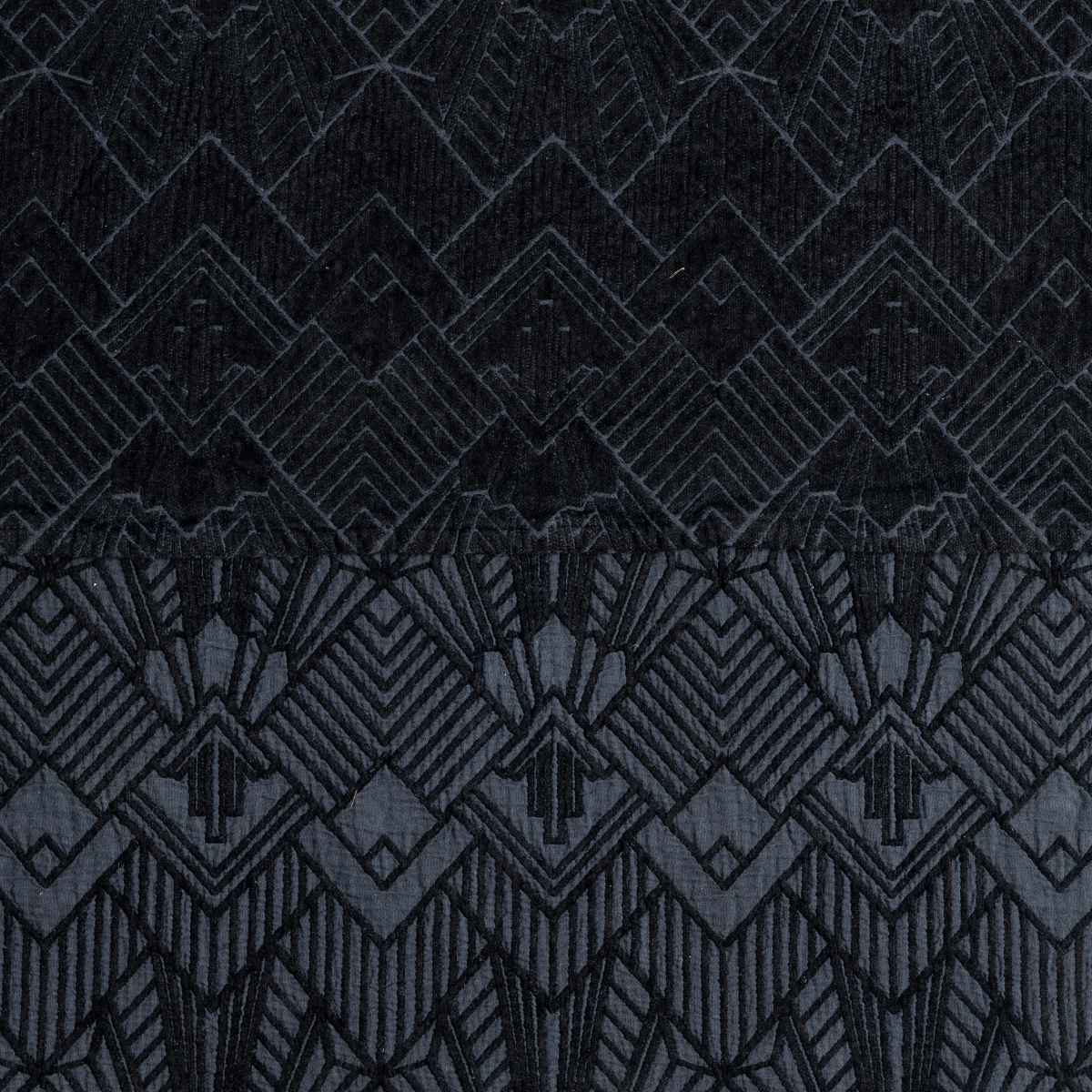 The Trettino Collection | Corvino | a close-up showing the chenille jacquard on the top half and cotton jacquard on the bottom in corvino, a classic black