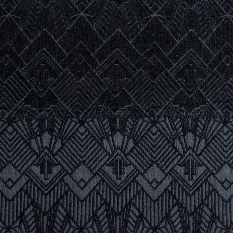 The Trettino Collection | Corvino | a close-up showing the chenille jacquard on the top half and cotton jacquard on the bottom in corvino, a classic black