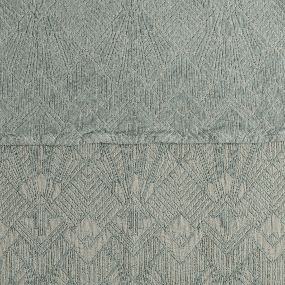 The Trettino Collection | Eucalyptus | a close-up showing the chenille jacquard on the top half and cotton jacquard on the bottom in eucalyptus, a delicate green.