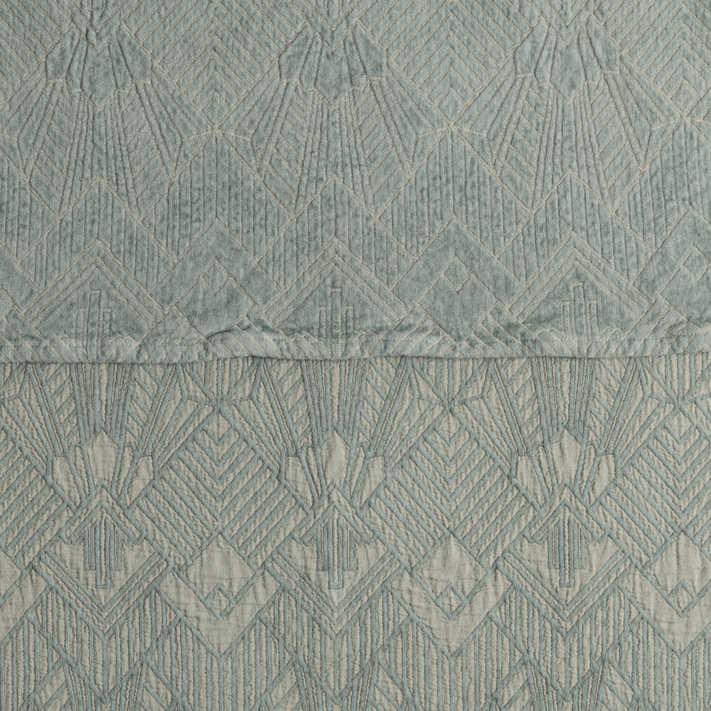 The Trettino Collection | Eucalyptus | a close-up showing the chenille jacquard on the top half and cotton jacquard on the bottom in eucalyptus, a delicate green.