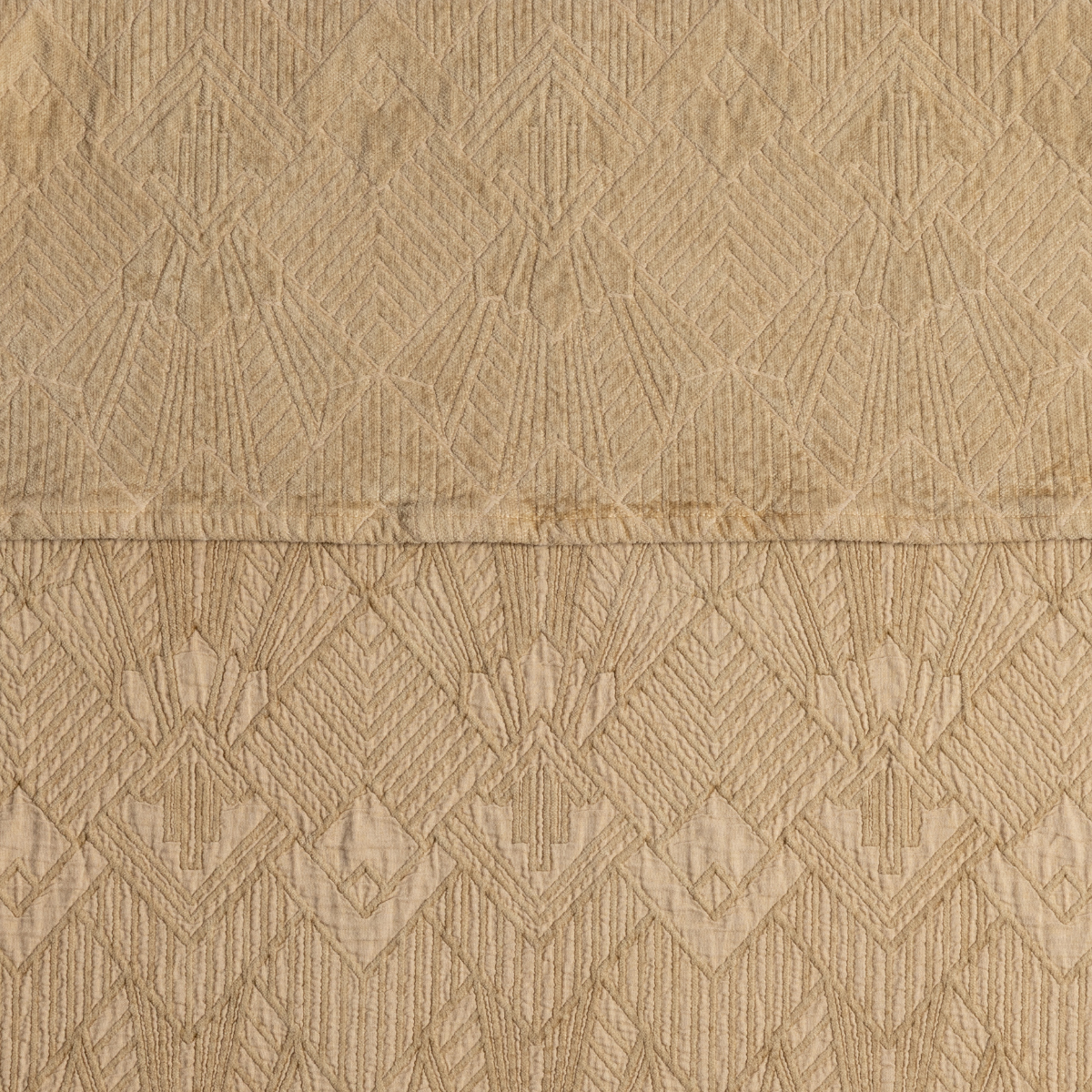 The Trettino Collection | Honeycomb | a close-up showing the chenille jacquard on the top half and cotton jacquard on the bottom in honeycomb, a butterscotch tone.