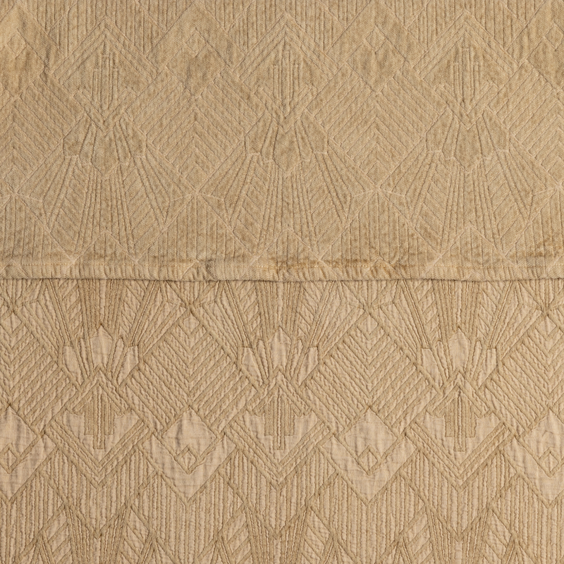The Trettino Collection | Honeycomb | a close-up showing the chenille jacquard on the top half and cotton jacquard on the bottom in honeycomb, a butterscotch tone.