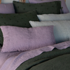 Ines Throw Pillow | embroidered midweight linen throw pillows in french lavender and eucalyptus with shams in junper.