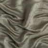Paloma Throw Pillow | Fog | Close-up of silk charmeuse in fog, a neutral-warm, soft mid-tone grey.