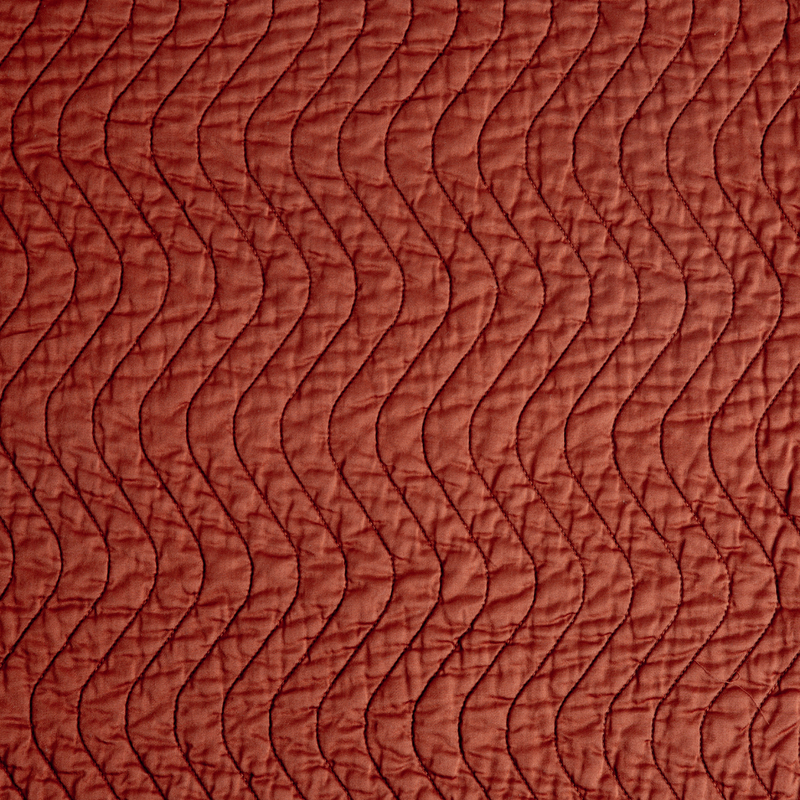 Cirillo Baby Blanket | Autumn | A close-up of Cirillo fabric in the colorway, Autumn, a rich terracotta tone.