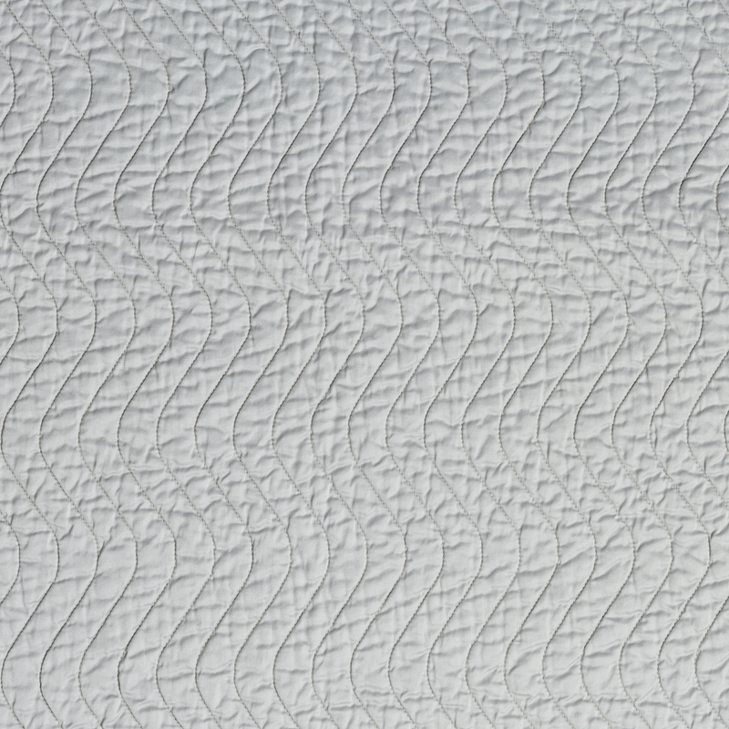 Cirillo Throw Pillow | Cloud | A close up of quilted cotton sateen fabric in cloud, a soft, subtle sky blue-grey.