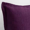 Cirillo Throw Pillow | Fig | a close up of a pillow corner showing the flange framing quilted cotton sateen shot against a white background.