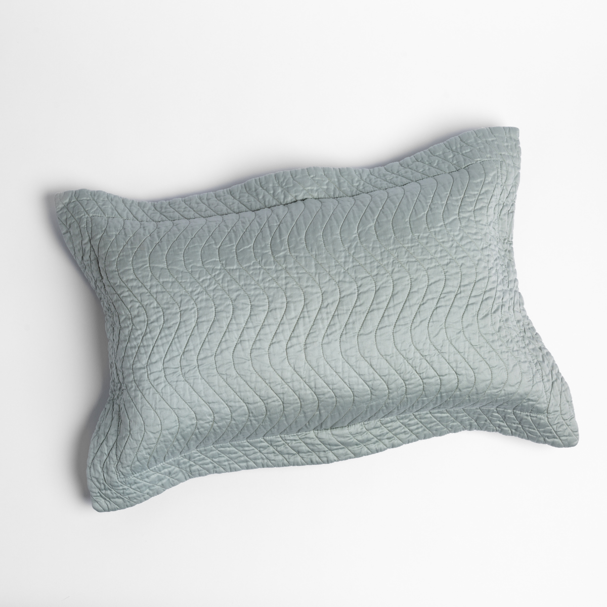 Cirillo Throw Pillow | Eucalyptus | 15x24 quilted cotton sateen throw pillow shot overhead against a white background.