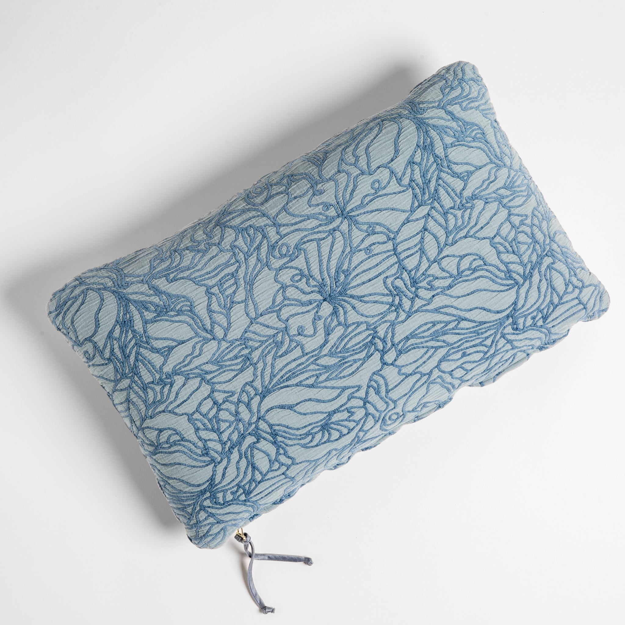 Georgia Throw Pillow | Tahoe Blue | cotton jacquard side of a rectangle throw pillow shown from overhead against a white background.