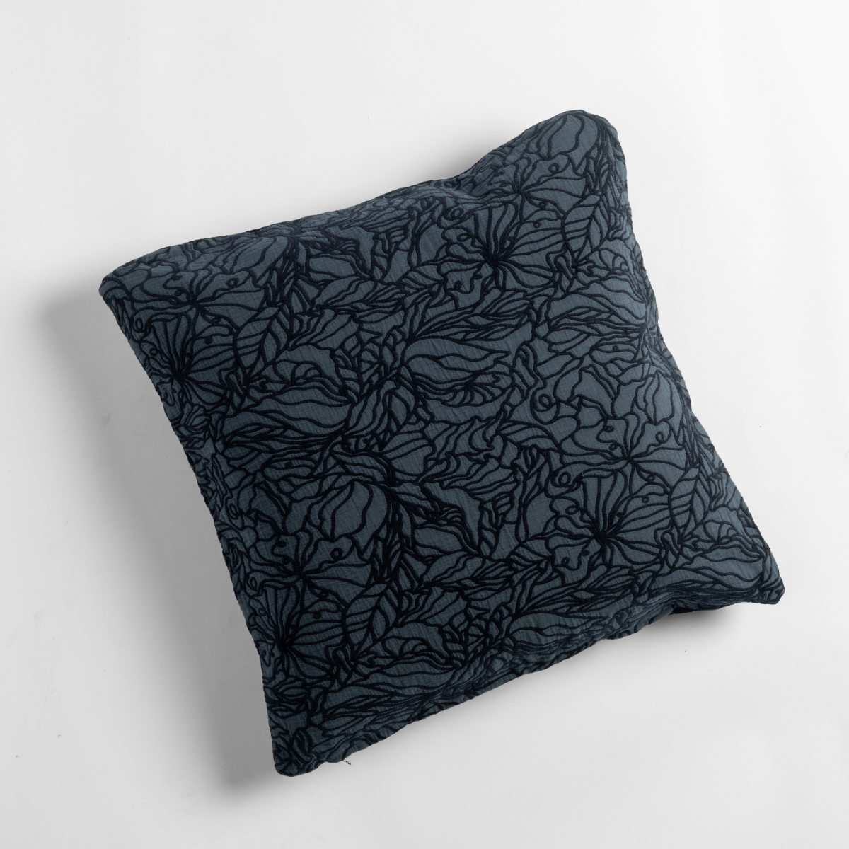 Slate | an overhead shot of a georgia throw pillow against a white background.