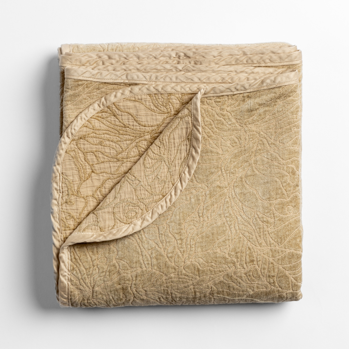 Georgia Blanket | Honeycomb | folded blanket with its cotton jacquard side visible on the corner foldback against the chenille jacquard side.