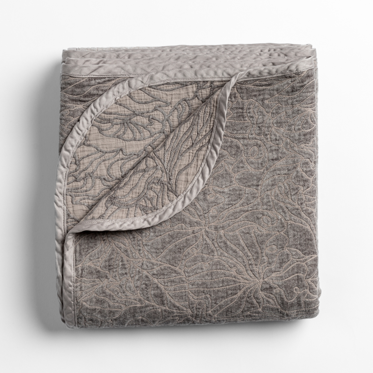 Georgia Blanket | Moonlight | folded blanket with its cotton jacquard side visible on the corner foldback against the chenille jacquard side.