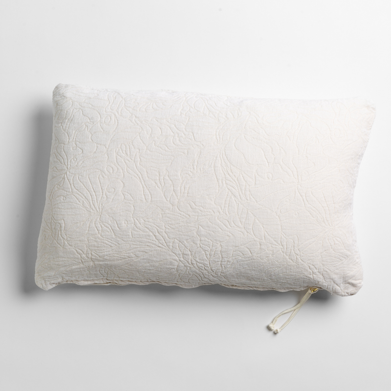 Georgia Throw Pillow | Winter White | chenille jacquard side of a rectangle throw pillow shown from overhead against a white background.