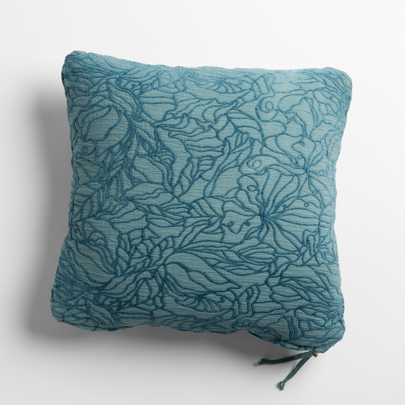 Georgia Throw Pillow | Cenote | cotton jacquard side of a georgia square cushion shown from overhead against a white background.