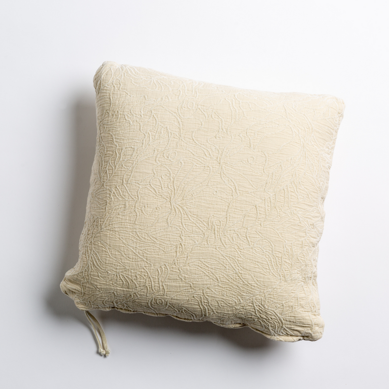 Georgia Throw Pillow | Parchment | cotton jacquard side of a georgia square cushion shown from overhead against a white background.