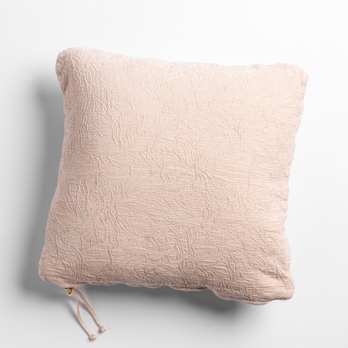 Georgia Throw Pillow | Pearl | cotton jacquard side of a georgia square cushion shown from overhead against a white background.