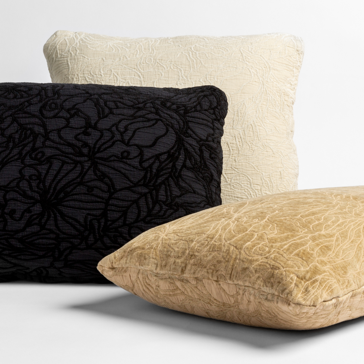 Georgia Throw Pillow | three throw pillows show the chenille and cotton jacquard faces of the reversible pillows in different colors against a white background. 