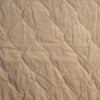 Harlow Swatch | Honeycomb | A close up of quilted cotton velvet fabric in honeycomb, a warm golden tone.