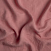 Linen Standard Pillowcase (Single) | Poppy | A close up of linen in poppy, a warm coral pink.