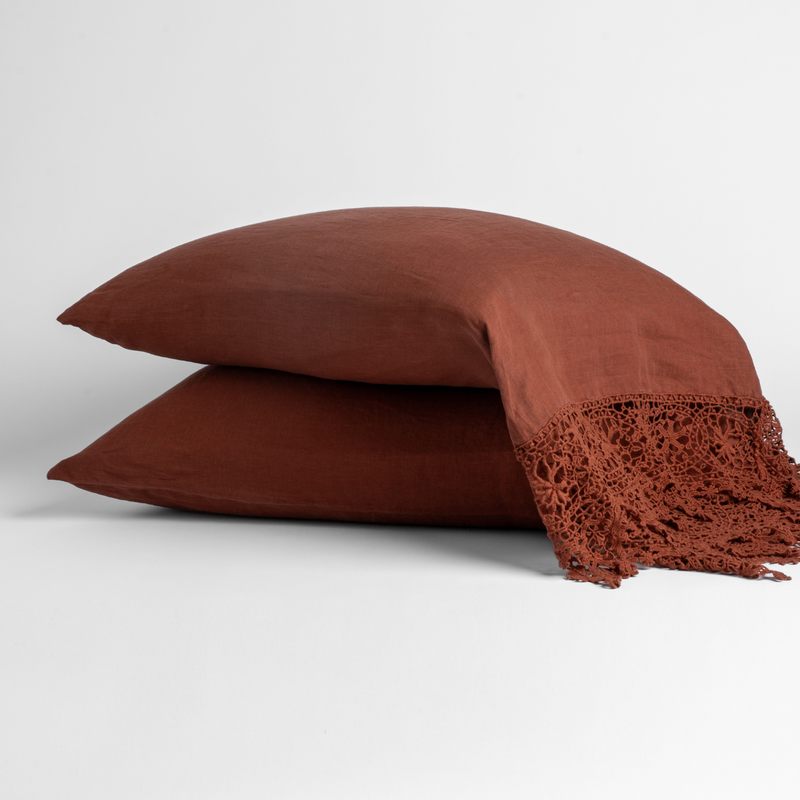 Linen Pillowcase (Single) | Autumn | A pair of Linen Frida pillowcases in Autumn, a rich terracotta tone, shown against a white background.