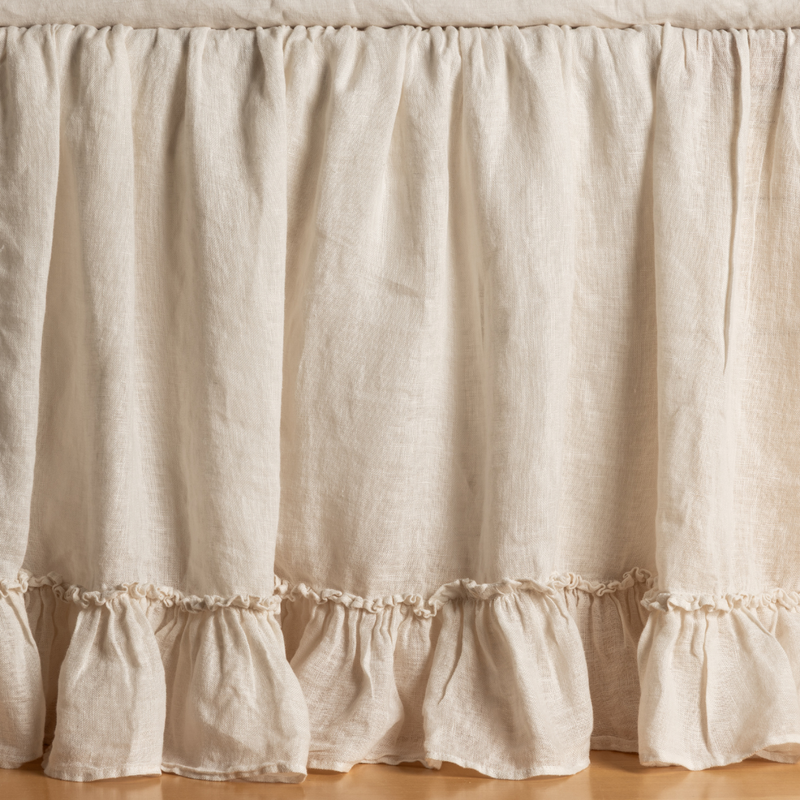 Linen Whisper Bed Skirt | Natural | a close up of the linen whipser bed skirt