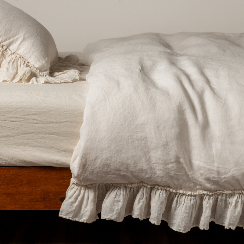 Linen Whisper Duvet Cover | Natural | a whisperweight linen ruffled duvet cover and matching sham shown from the side