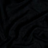 Linen Whisper Duvet Cover | Corvino | A close up of linen whisper, our lightweight linen gauze, in corvino, a black tone.