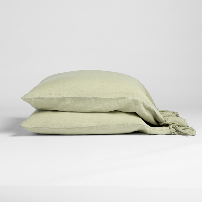 Linen Whisper Pillowcase (Single) | Desert Sage | matching pillowcases in desert sage, a serenely elegant green, offering a hushed hue, shown against a plain background.