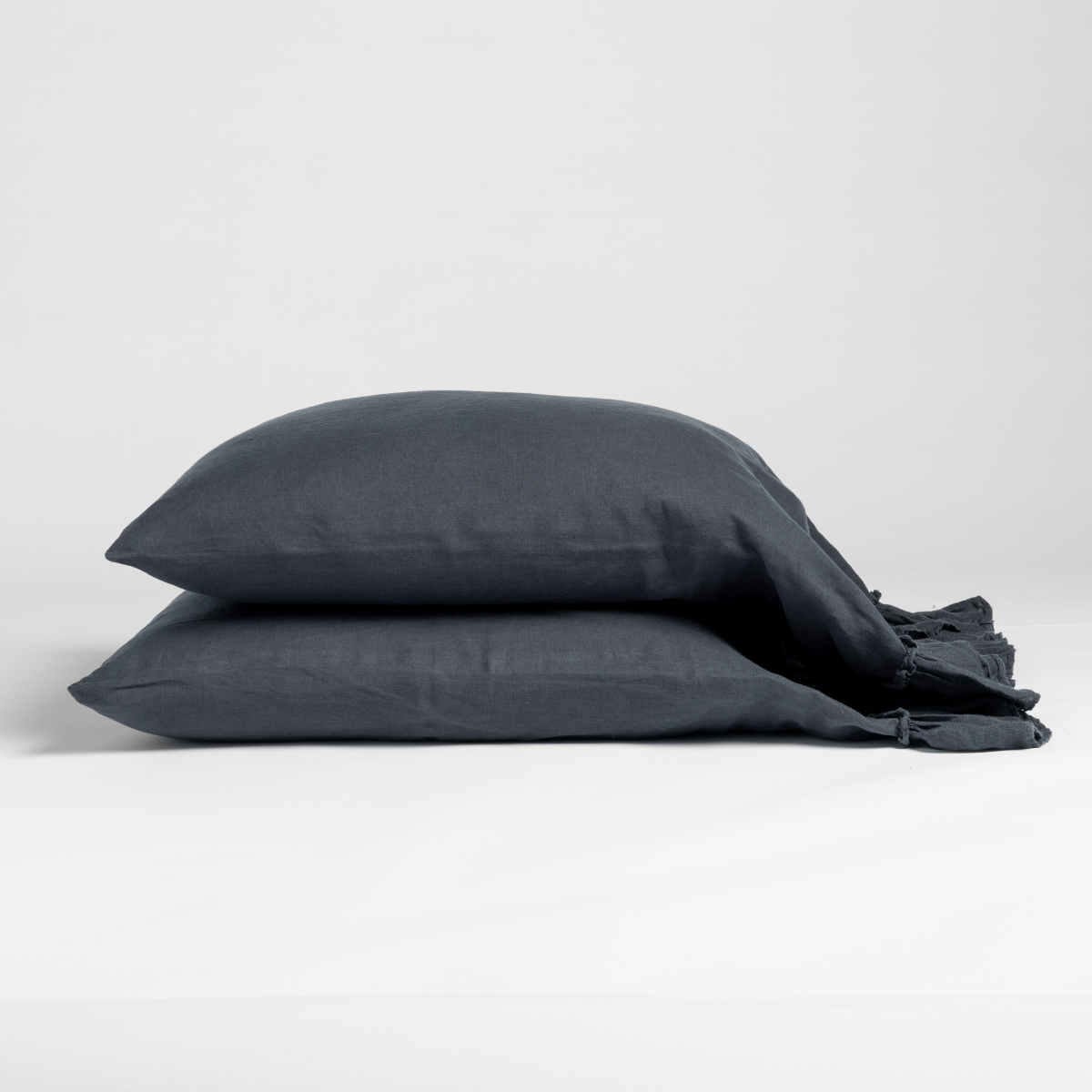 Linen Whisper Pillowcase (Single) | Slate | linen with whisperweight linen ruffle pillowcase pair shown against a plain white background.