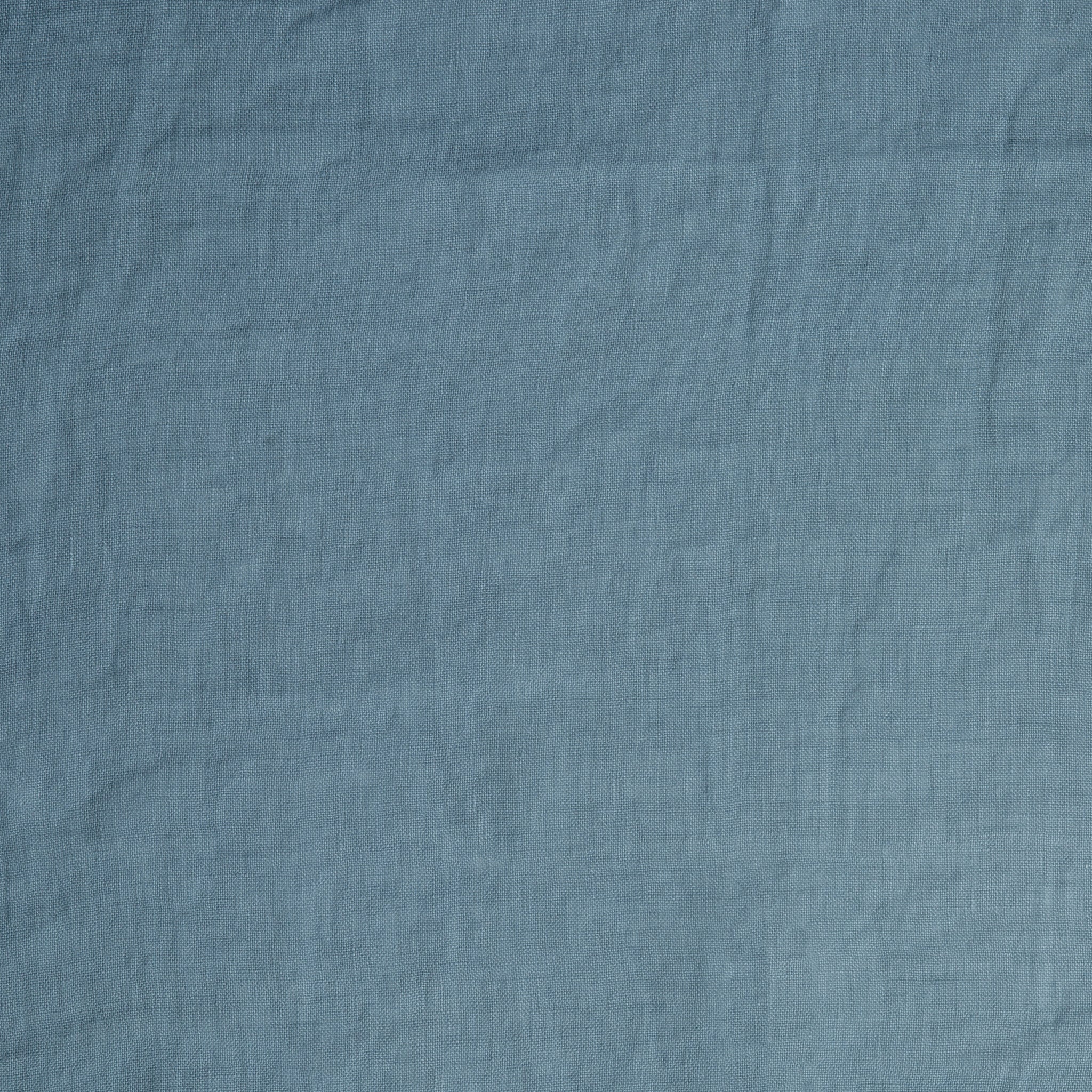 Madera Luxe Pillowcase (Single) | Tahoe Blue | A close up of linen fabric in the colorway, Tahoe Blue, a saturated blue like a crystal clear sky.