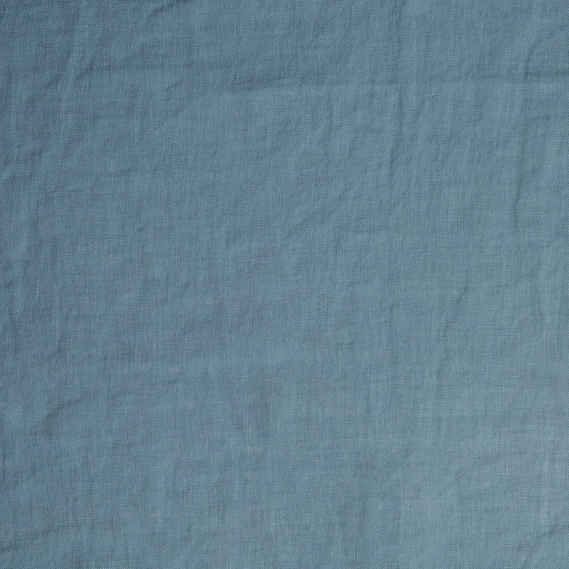 Madera Luxe Pillowcase (Single) | Tahoe Blue | A close up of linen fabric in the colorway, Tahoe Blue, a saturated blue like a crystal clear sky.