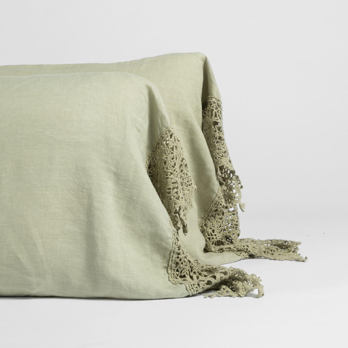Linen Pillowcase (Single) | Desert Sage | matching pillowcases with lace in desert sage, a serenely elegant green, offering a hushed hue, shown against a plain background.