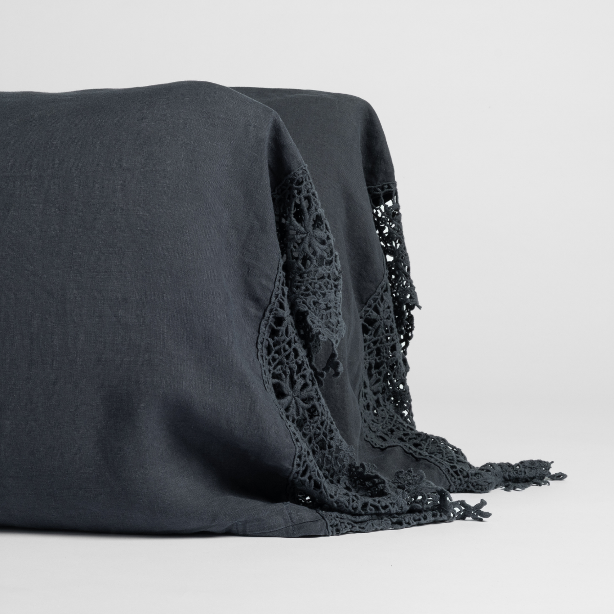 Linen Pillowcase (Single) | Slate | linen witth cotton lace trimmed pillowcase pair shown upright against a plain white background.