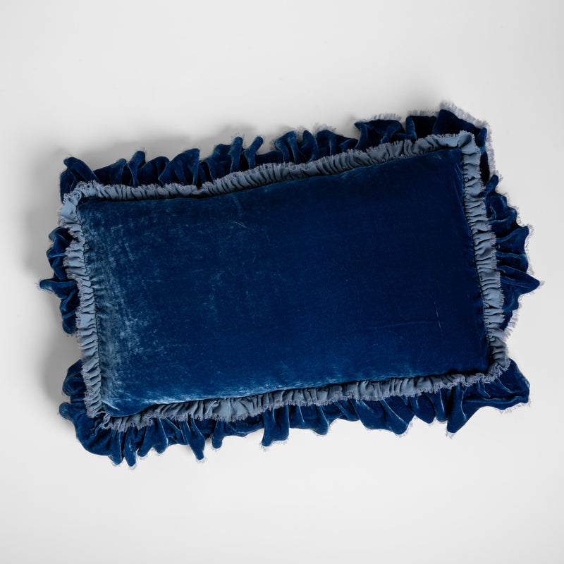 Loulah Throw Pillow | Tahoe Blue | overhead shot of a 15x24 silk velvet pillow with a raw edge ruffle detail.