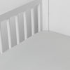 Madera Luxe Crib Sheet | Cloud | crib sheet shown on a mattress shown from overhead into the corner of a crib.