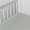 Madera Luxe Crib Sheet | Mineral | crib sheet shown on a mattress shown from overhead into the corner of a crib.