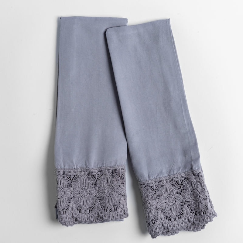 Madera Luxe Pillowcase (Single) | French Lavender | a pair of tencel pillowcases trimmed with cotton lace shown overhead against a white background.