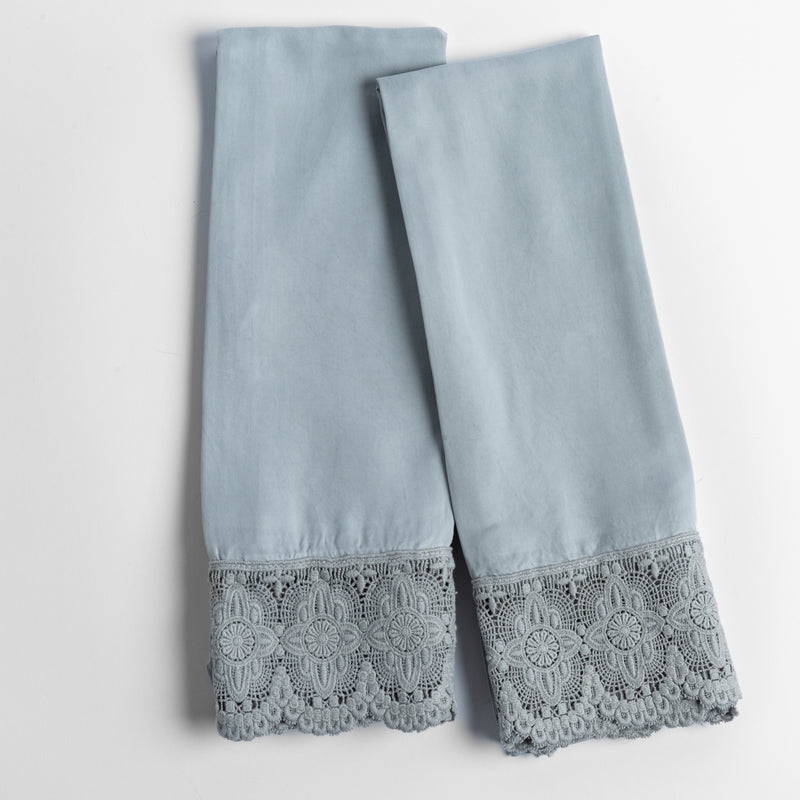 Madera Luxe Pillowcase (Single) | Mineral | a pair of tencel pillowcases trimmed with cotton lace shown overhead against a white background.