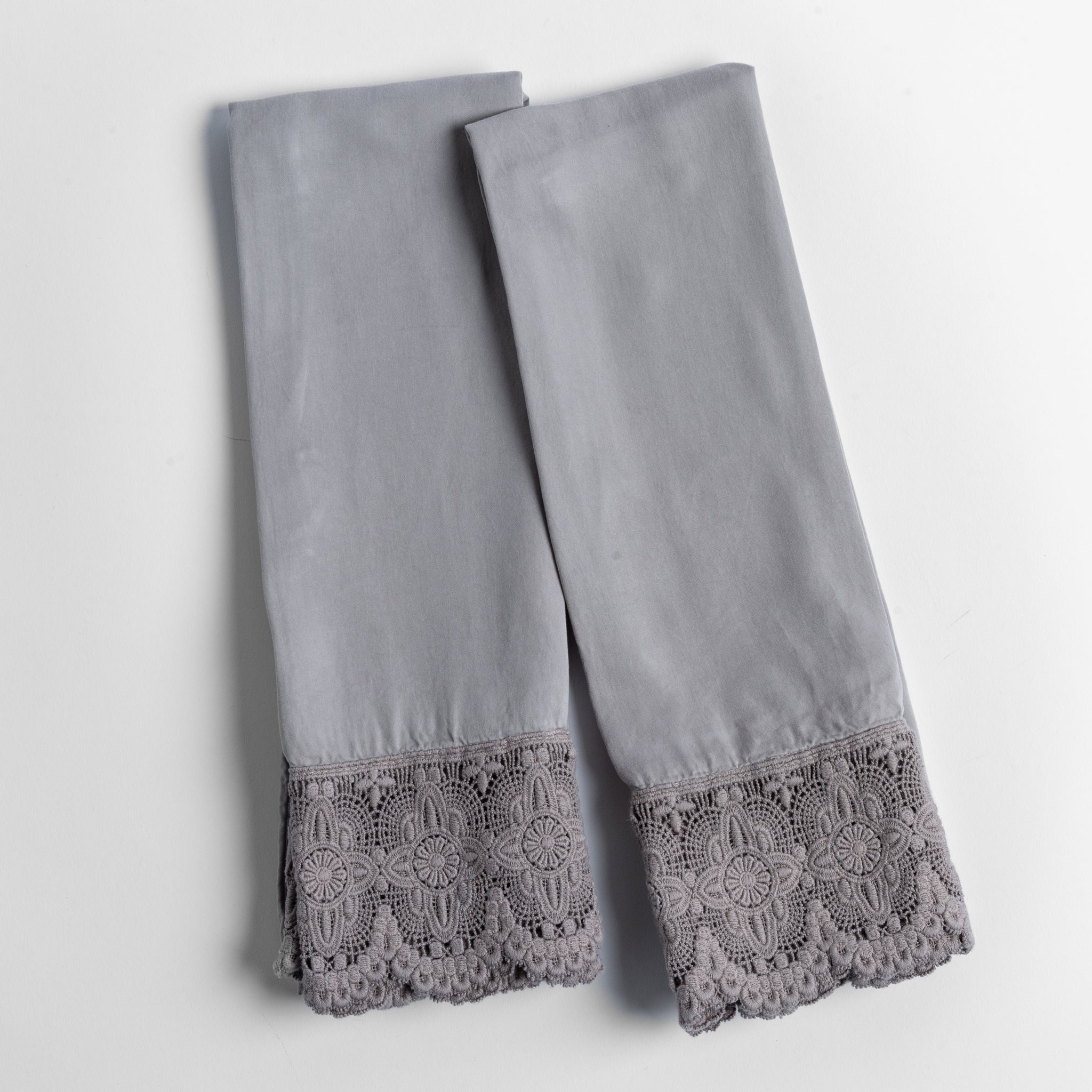 Madera Luxe Pillowcase (Single) | Moonlight | a pair of tencel pillowcases trimmed with cotton lace shown overhead against a white background.