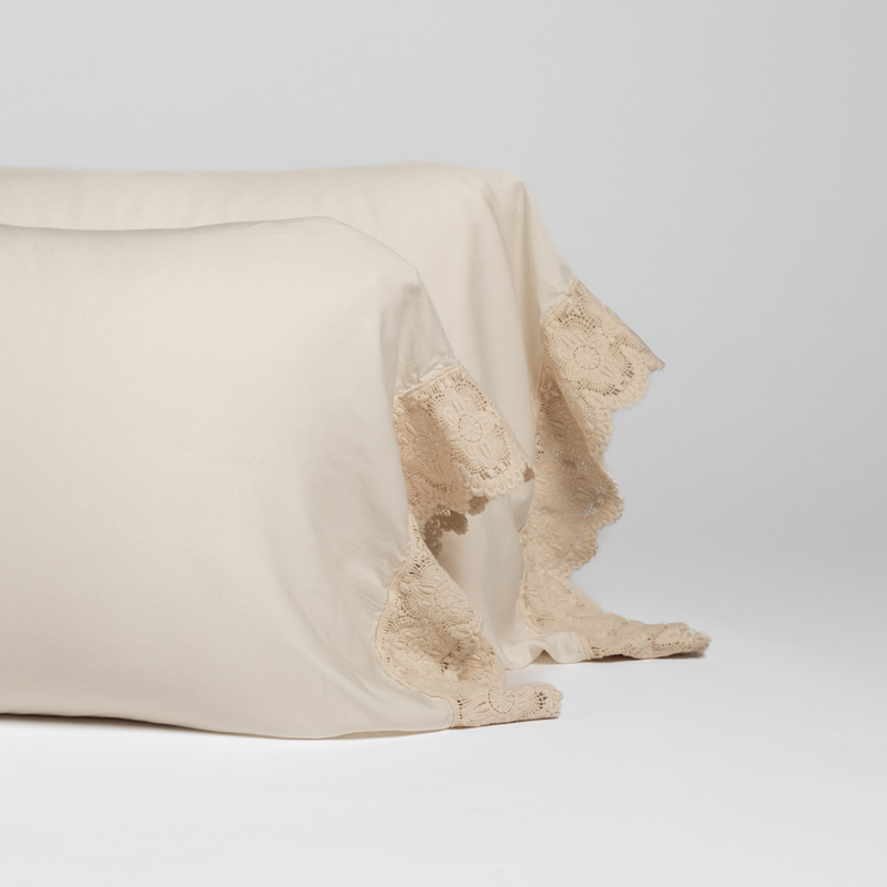 Madera Luxe Pillowcase (Single) | Natural | a pair of tencel pillowcases trimmed with cotton lace.
