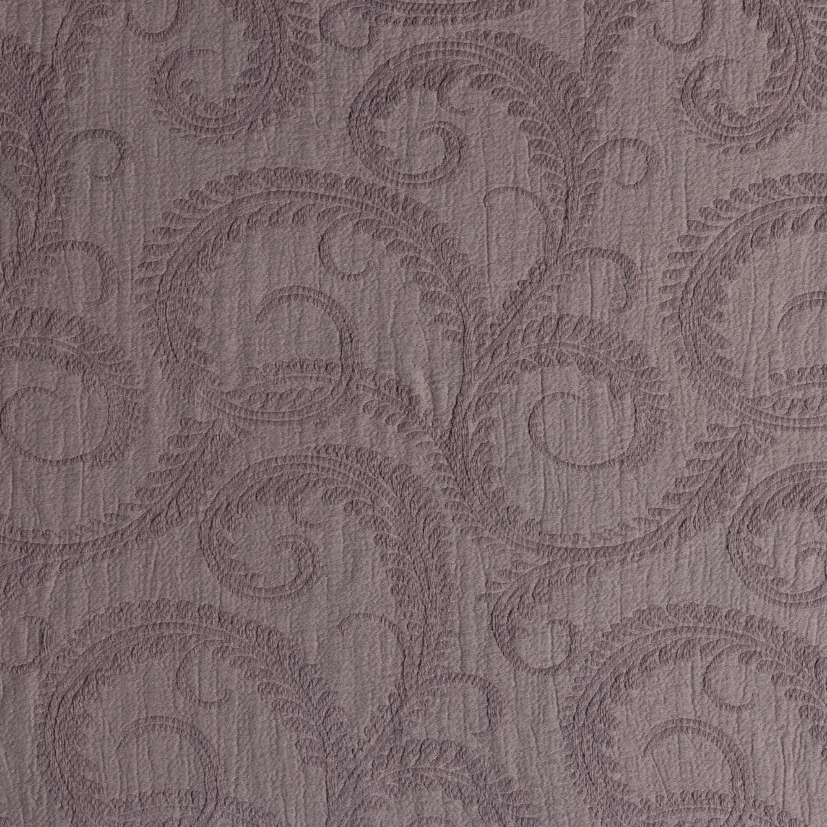 Marisette Bedspread | French Lavender | close-up of marisette fabric in french lavender, a soft light purple tone.