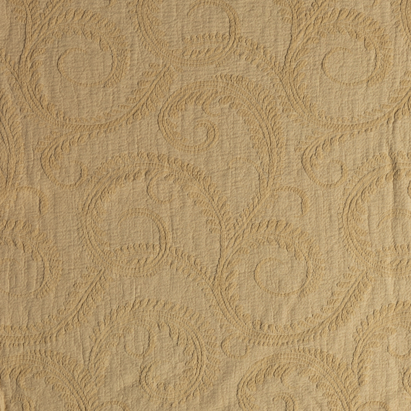 Marisette Bedspread | Honeycomb | close-up of marisette fabric in honeycomb, a golden butterscotch hue