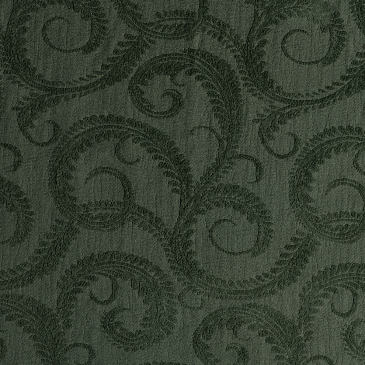 Marisette Bedspread | Juniper | close-up of marisette fabric in juniper, a deep green shade.