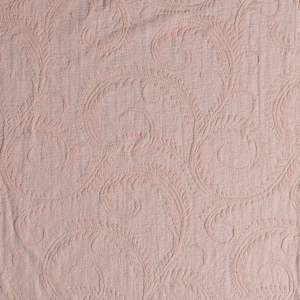 Marisette Bedspread | Pearl | close-up of marisette fabric in pearl, a soft pink hue