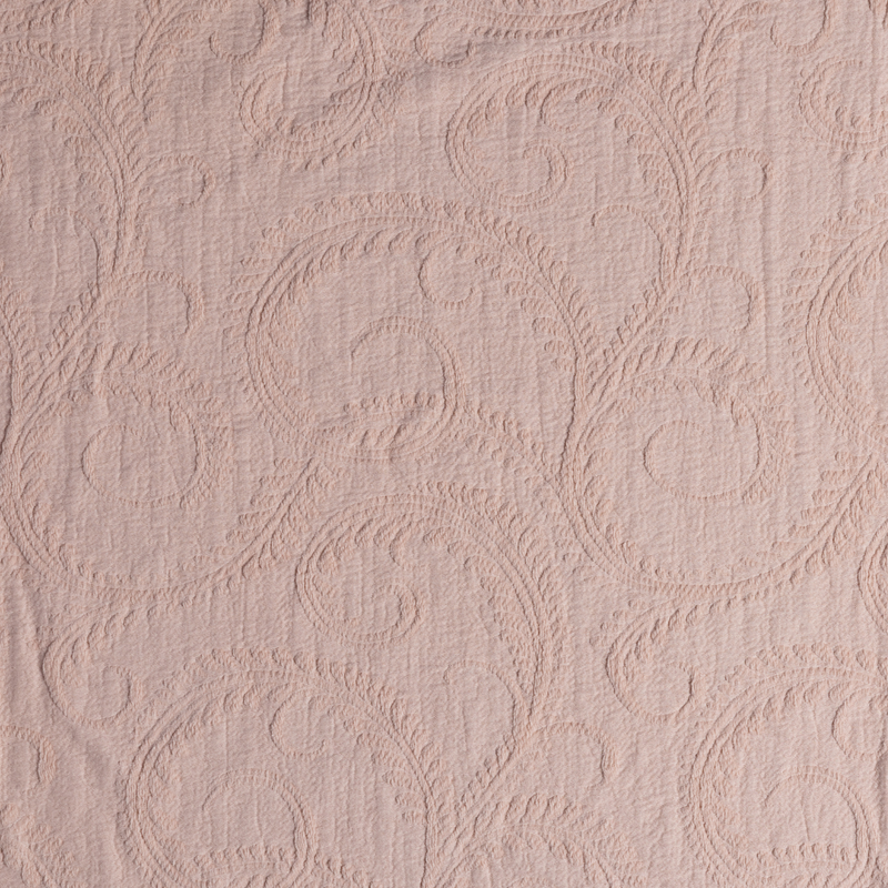 Marisette Bedspread | Pearl | close-up of marisette fabric in pearl, a soft pink hue