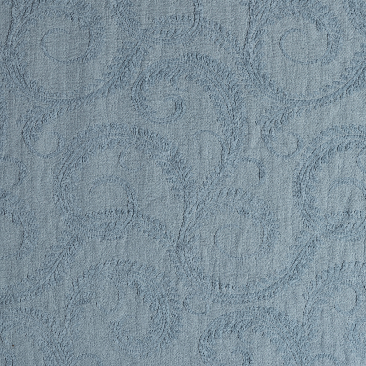 Marisette Bedspread | Tahoe Blue | a close-up of marisette fabric in tahoe blue, a true blue tone