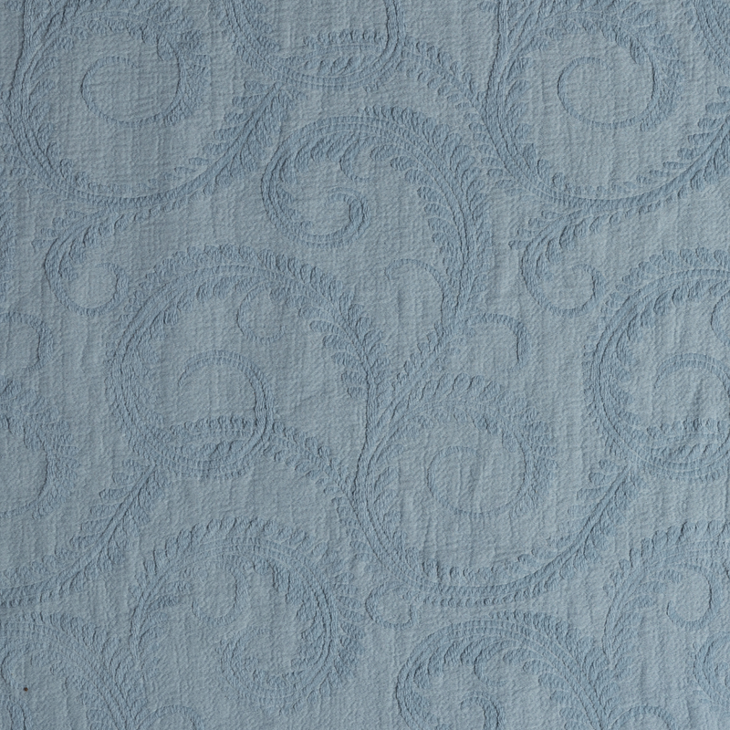 Marisette Bedspread | Tahoe Blue | a close-up of marisette fabric in tahoe blue, a true blue tone