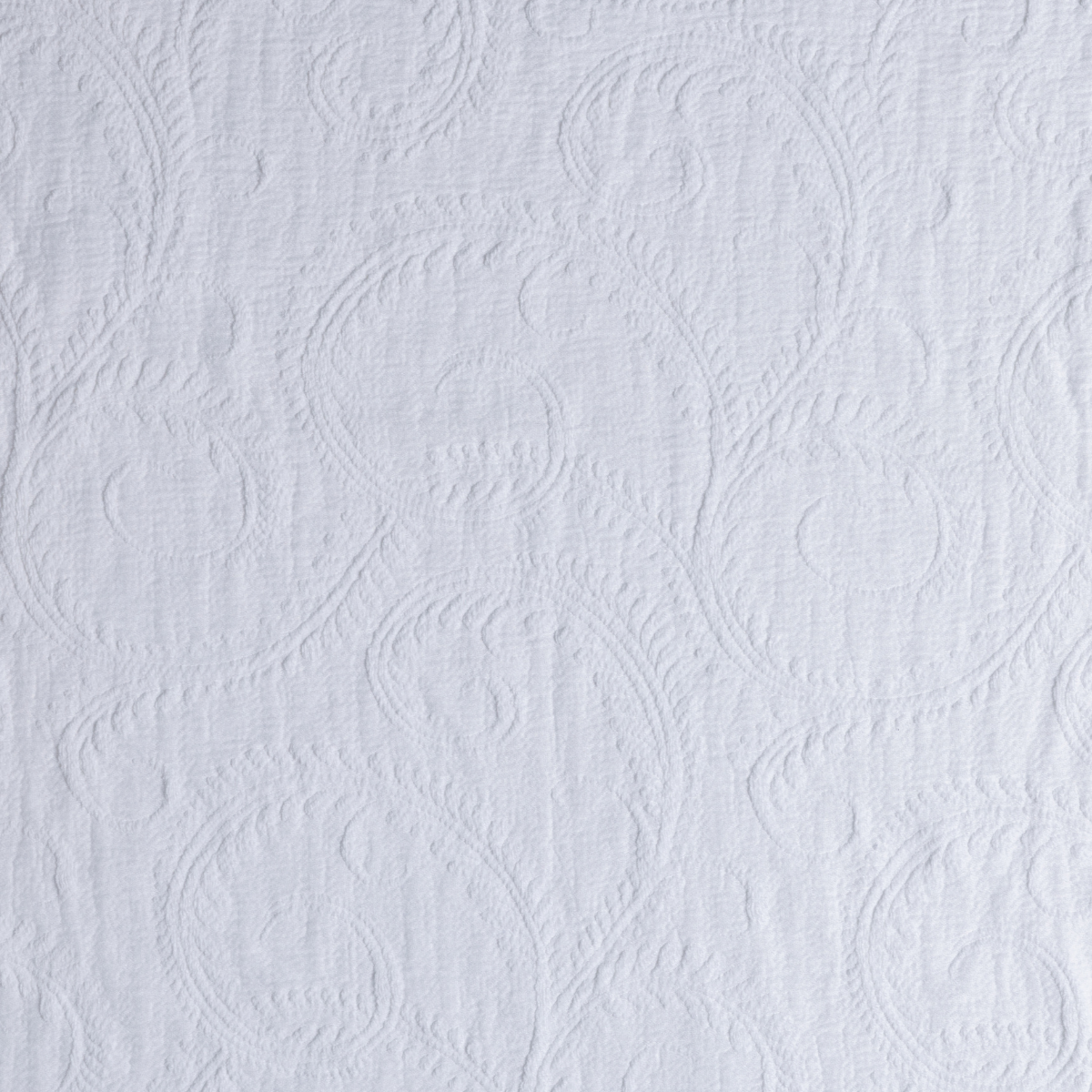Marisette Bedspread | White | close-up of marisette fabric in white.