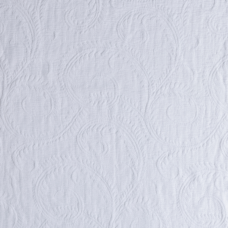 Marisette Bedspread | White | close-up of marisette fabric in white.